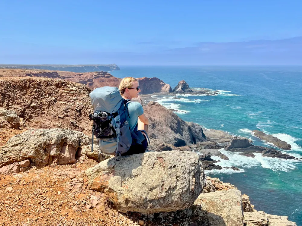 Aleks viewing over the incredible cliffs near Sagres